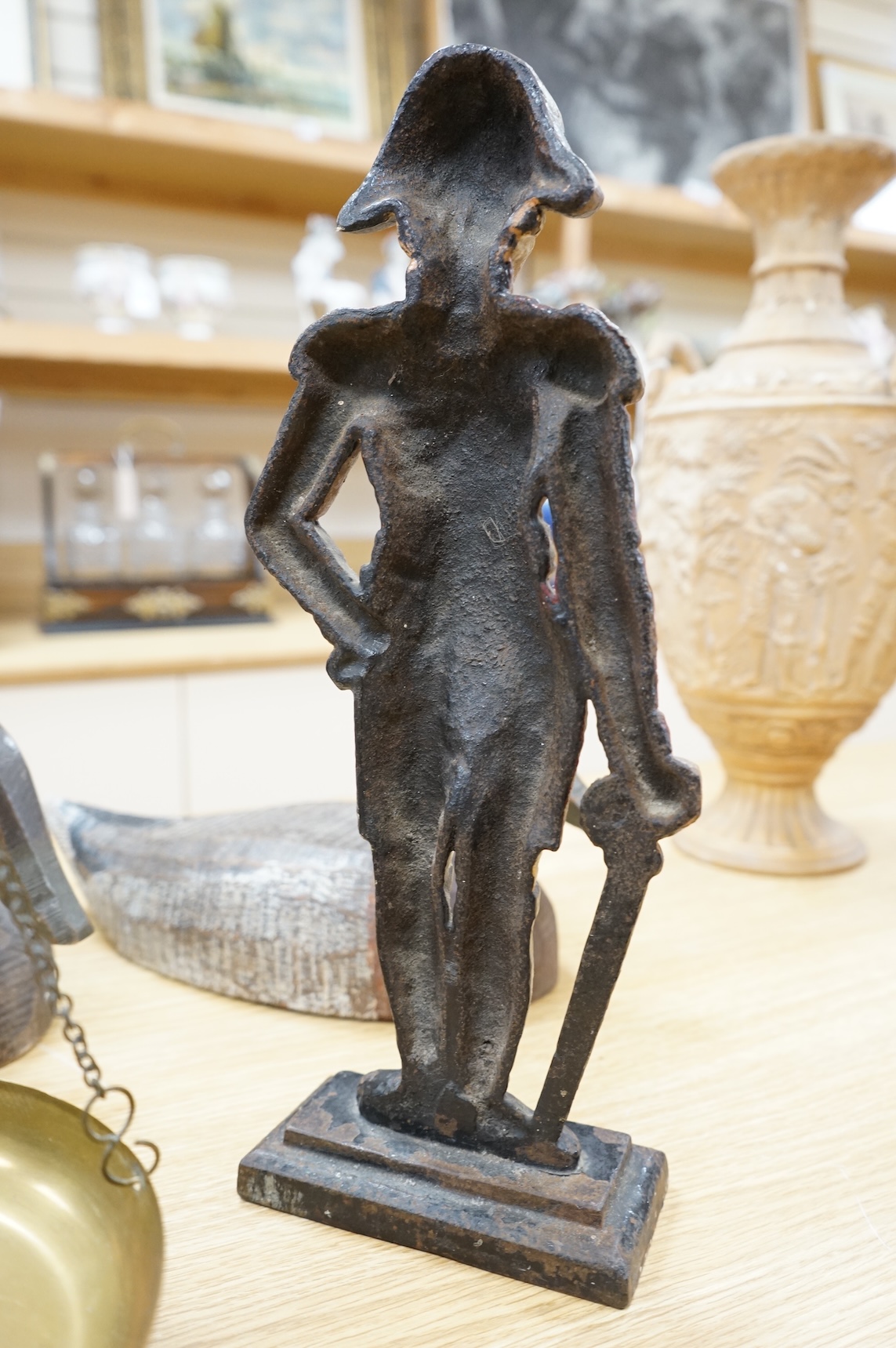 A cast iron ‘Admiral’ door-stop and two wooden decoy ducks, door stop 35cm high